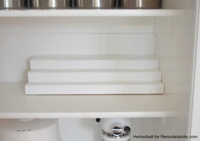 This is such an straightforward project to organize spice bottles. Build a direct tiered spice rack from a 2x4 wood board with free plans on Bekob.