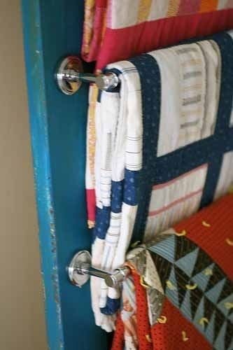Smart! towel racks on a door with blankets