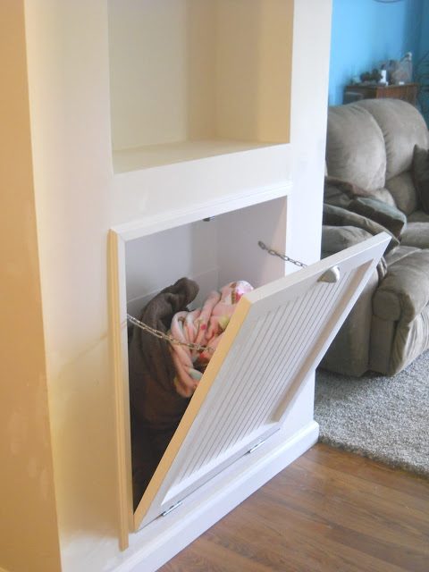 built in storage space for blankets, this is so smart