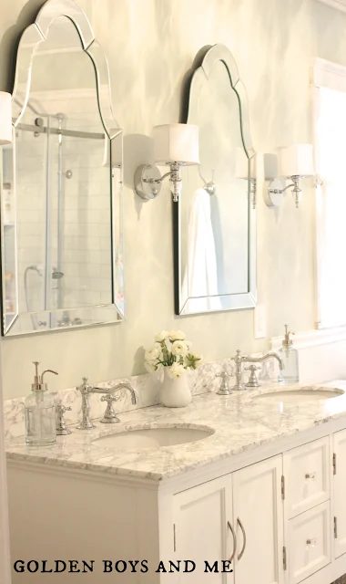 double vanity with two curvy mirrors, elegant master bath remodel featured on Bekob.com
