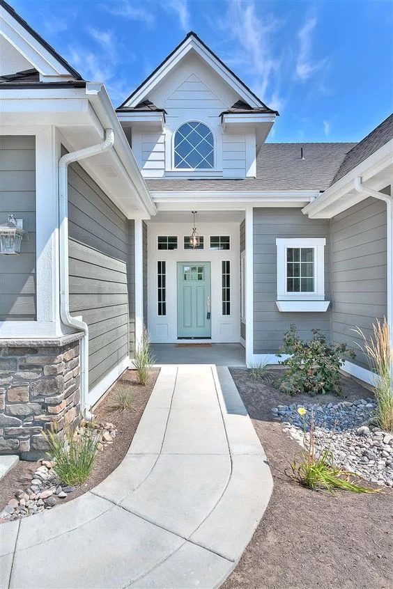 Exterior Paint Colors that Increase Curb Appeal | Exterior color is Amherst Gray Benjamin Moore and Door Color is Wythe Blue Benjamin Moore | More info on Bekob.com