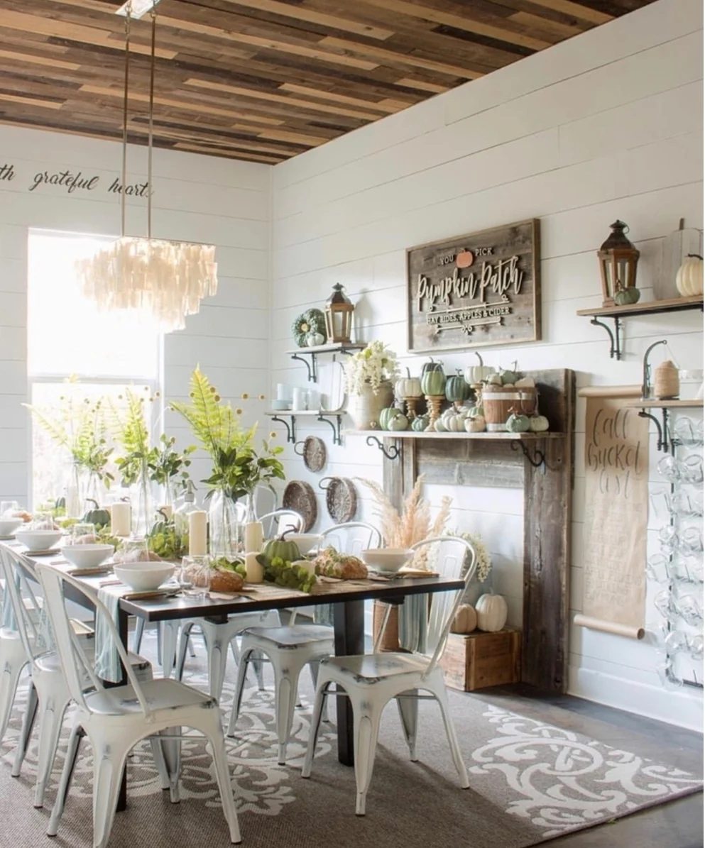 Pumpkin Mantel With Pumpkin Patch Sign And striking Fall TableScape On Barn Wood Table And White Metal Chairs