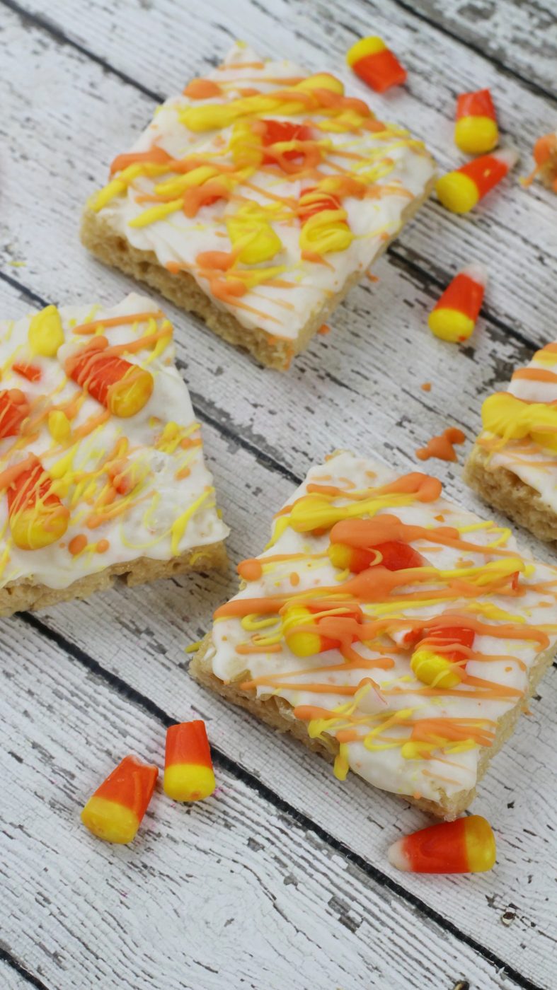 Get festive for Fall with these delicious fall candy corn rice krispies recipe via Bekob.com