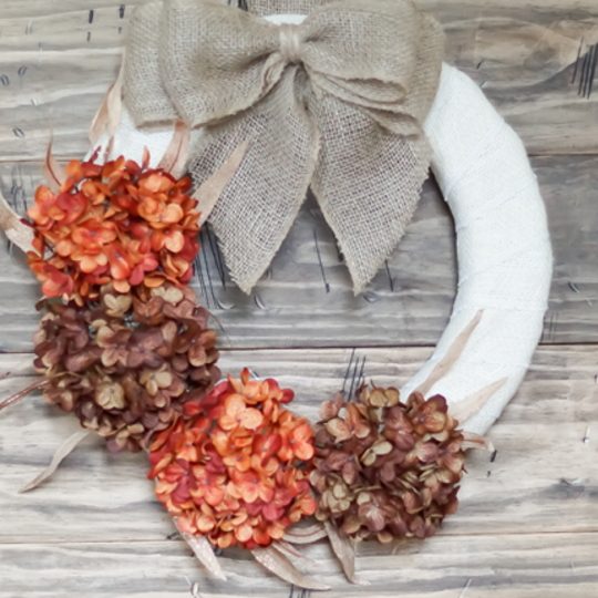 Fall Wreath, Cream Wrapped With Burlap Bow And Brown And Orange Flowers