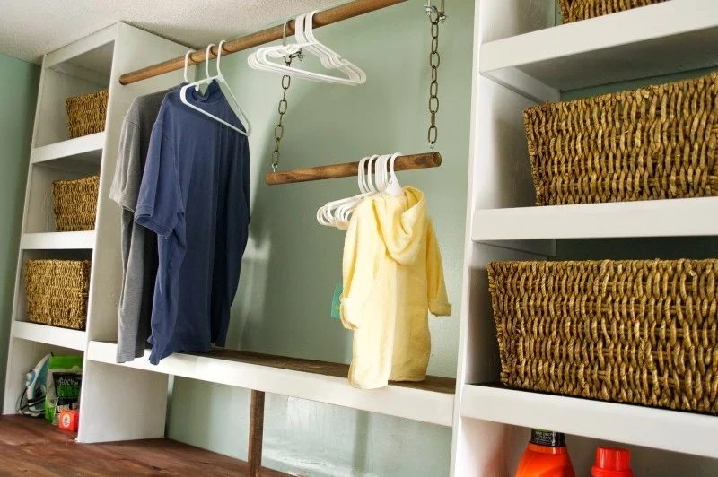 Built In White Laundry Room Shelves With Wicker Baskets