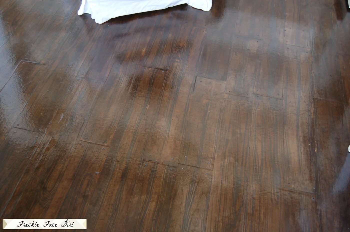 Handmade faux wood flooring, brown paper bag floor with faux wood planks