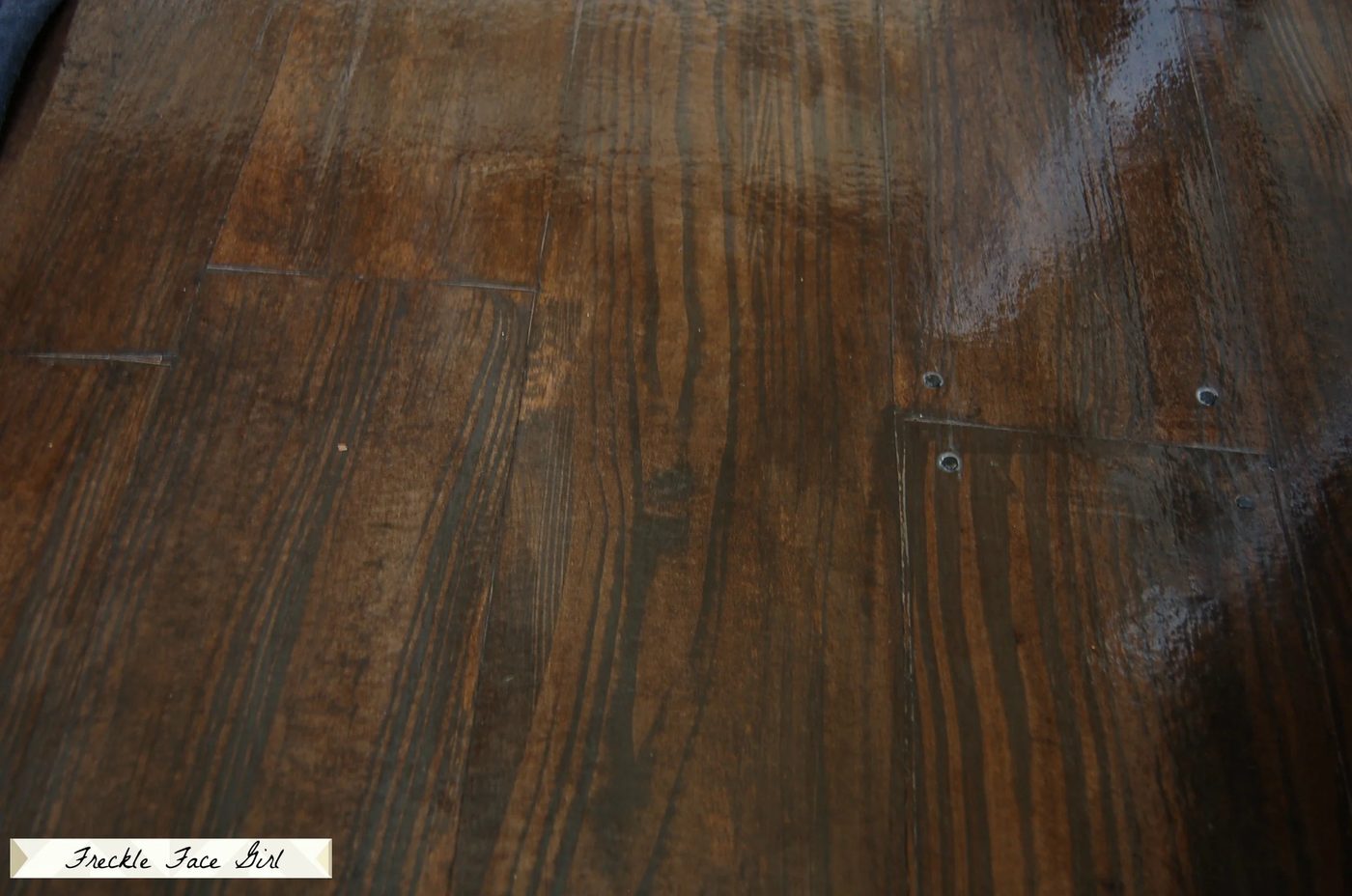 Handmade faux wood plank floor, painted and stained paper bag brown paper flooring to look like wood