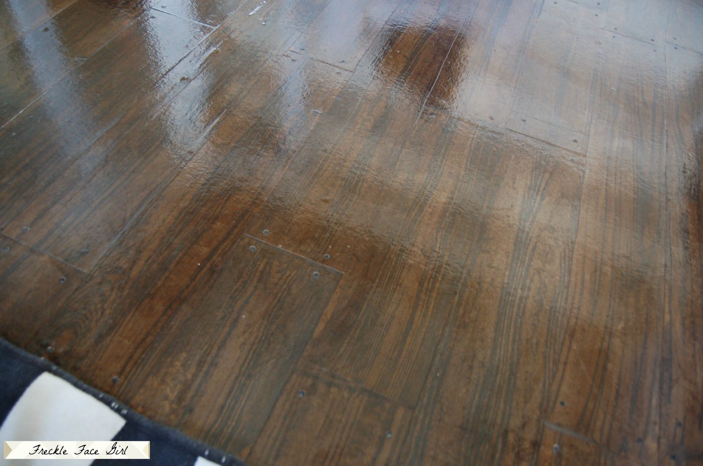 Handmade paper bag floor, faux wood brown paper flooring with painted and stained faux wood planks