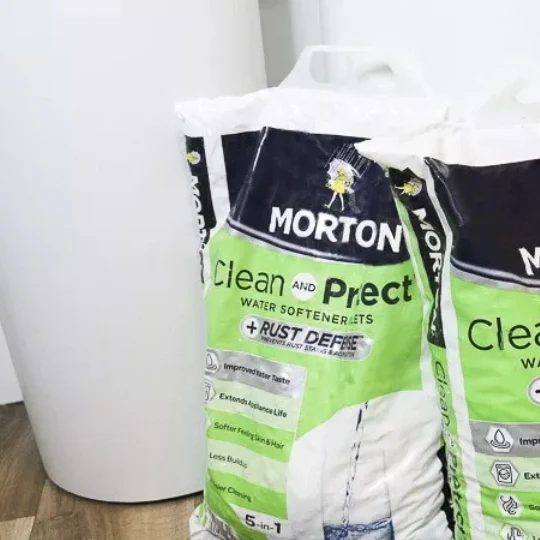 White Water Softener Base With Bags Of Morton Salt In Front