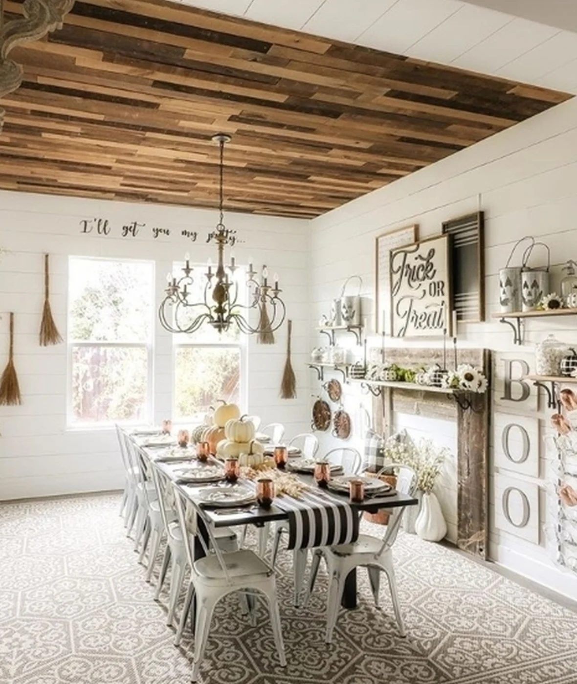 Patterned Floor With Long Rectangular Table With Every Sort Of vivid Fall And Halloween Decor Surrounding The Room And Table