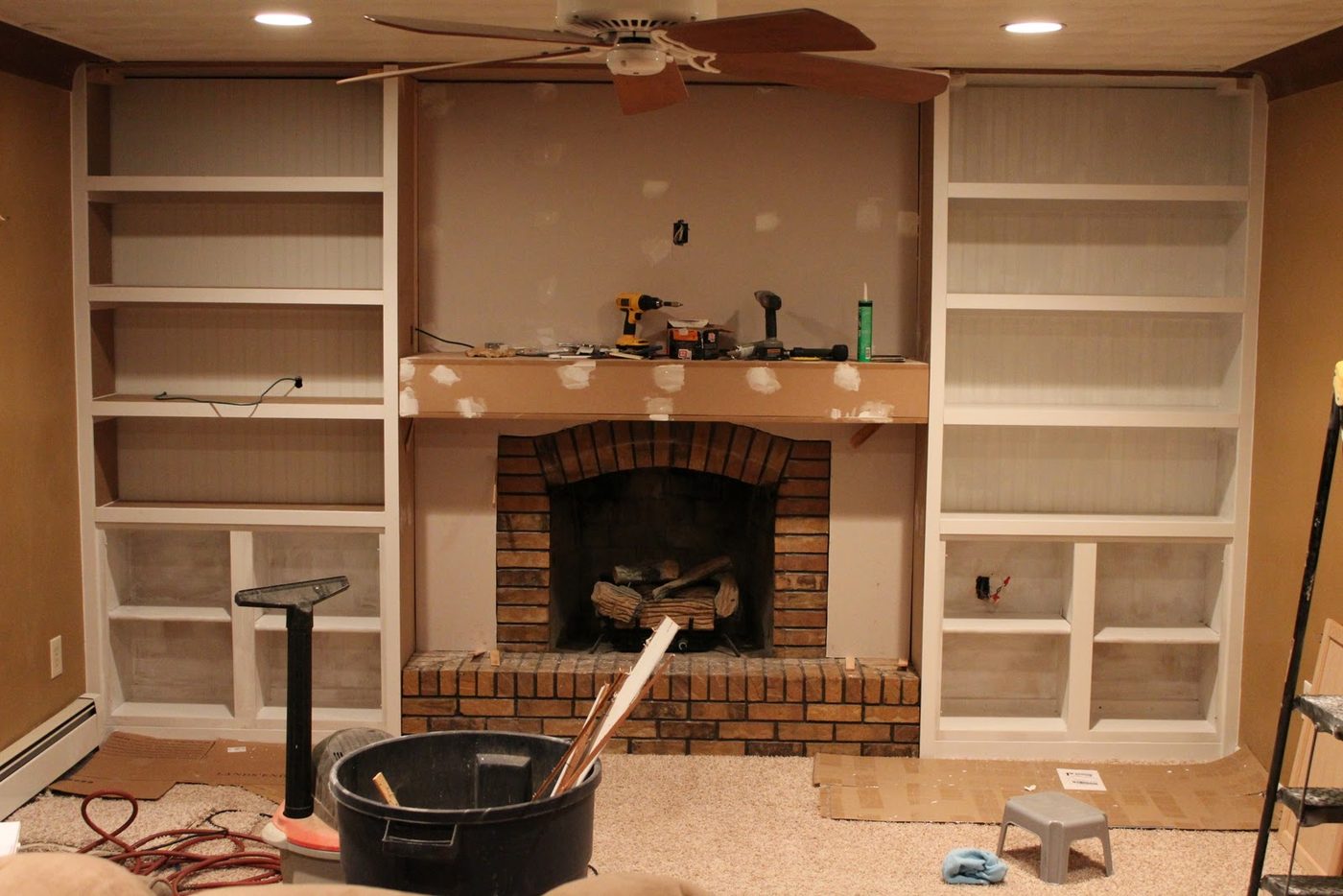 Fireplace Makeover with builtins made from stock cabinetry (1)