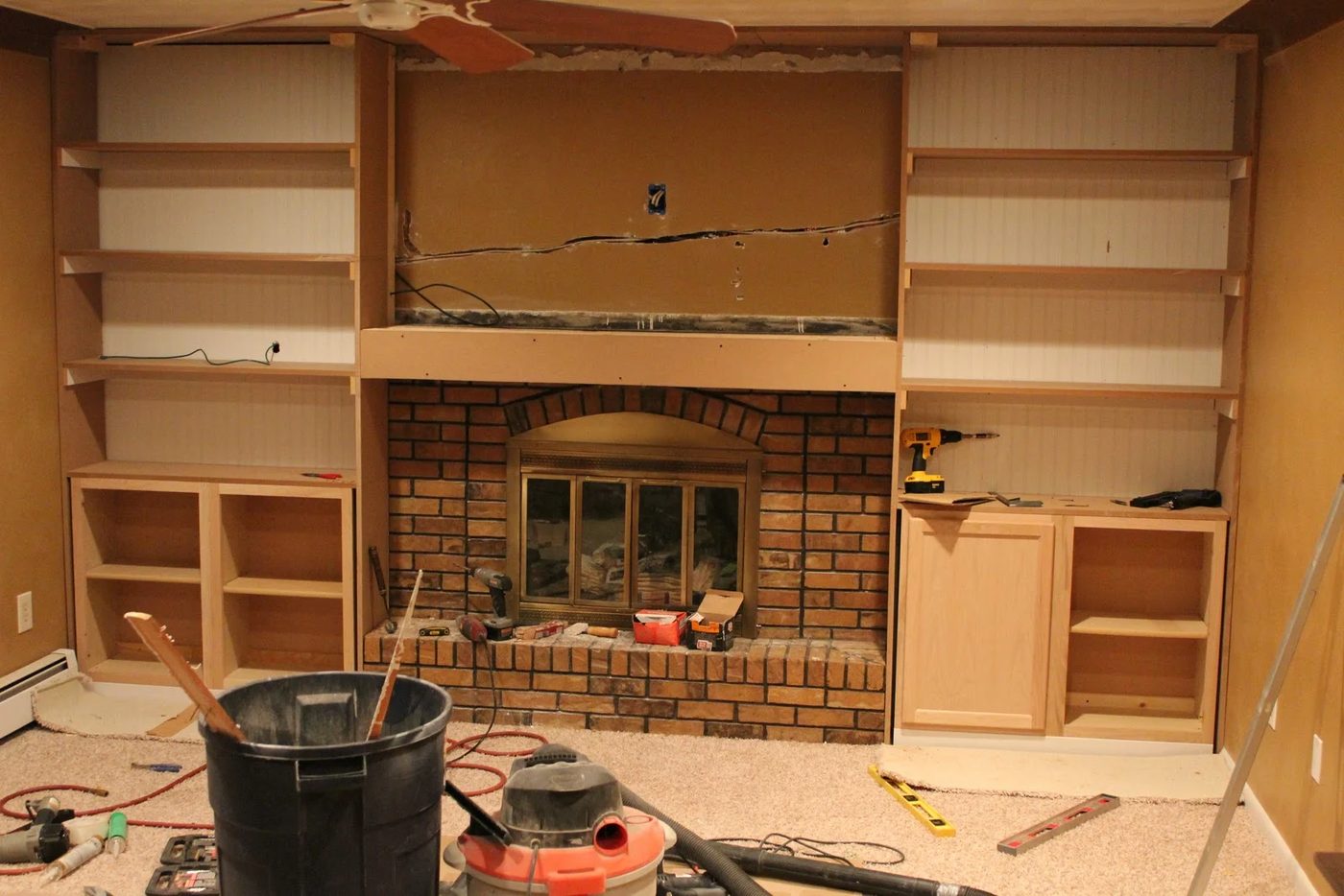 Fireplace Makeover with builtins made from stock cabinetry (1)