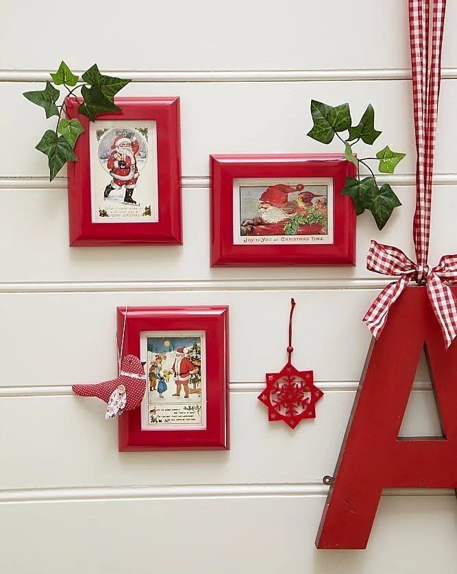 vintage Christmas cards framed in red frames -- so well fitted!