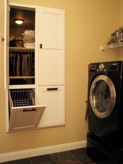 brilliant master bedroom laundry hamper solution!
