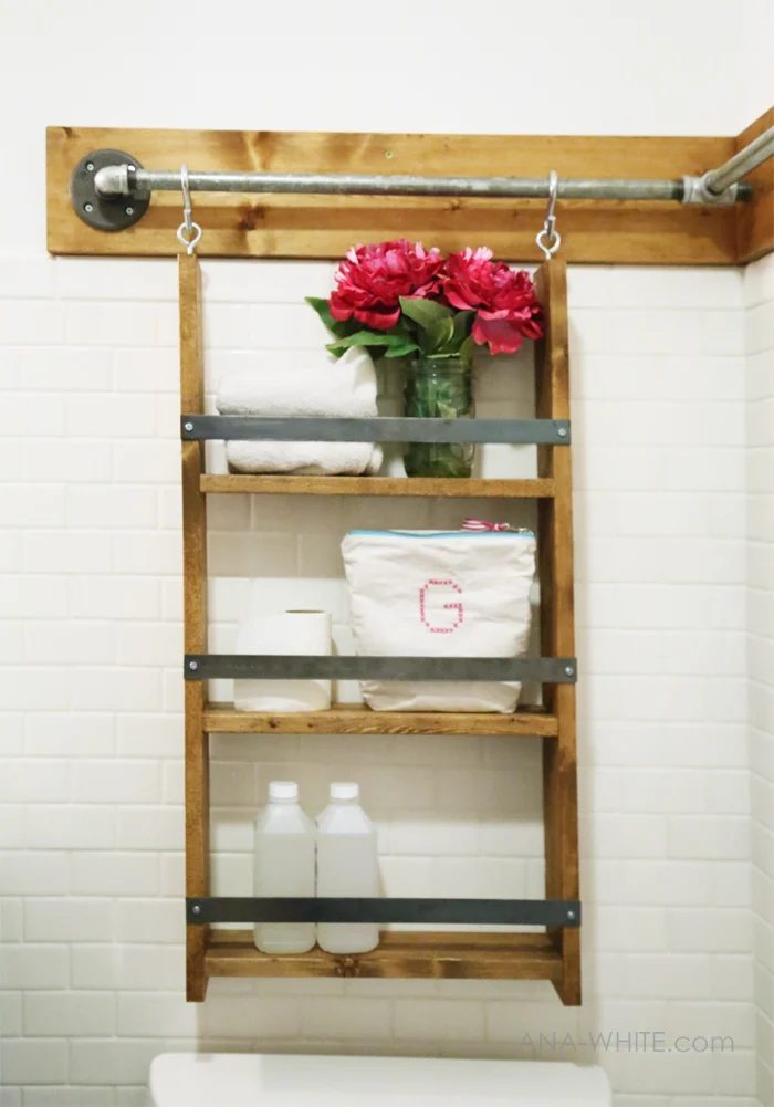 multifunctional and direct Handmade bathroom organizer -- hang this shelf or anything (like towels on S hooks) from the rail. Brilliant!