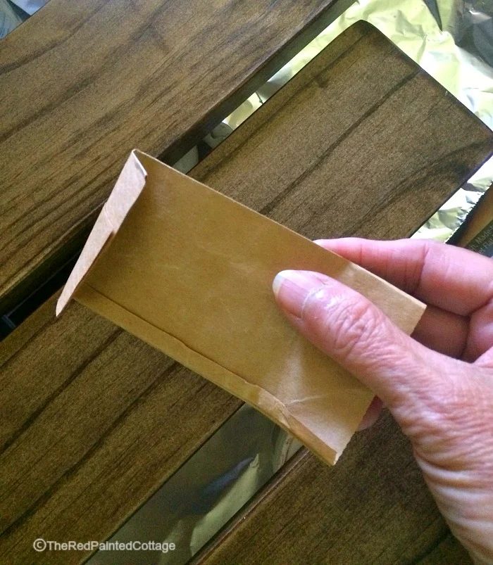 use a brown paper bag to get a clearly smooth furniture finish, The Red Painted Cottage