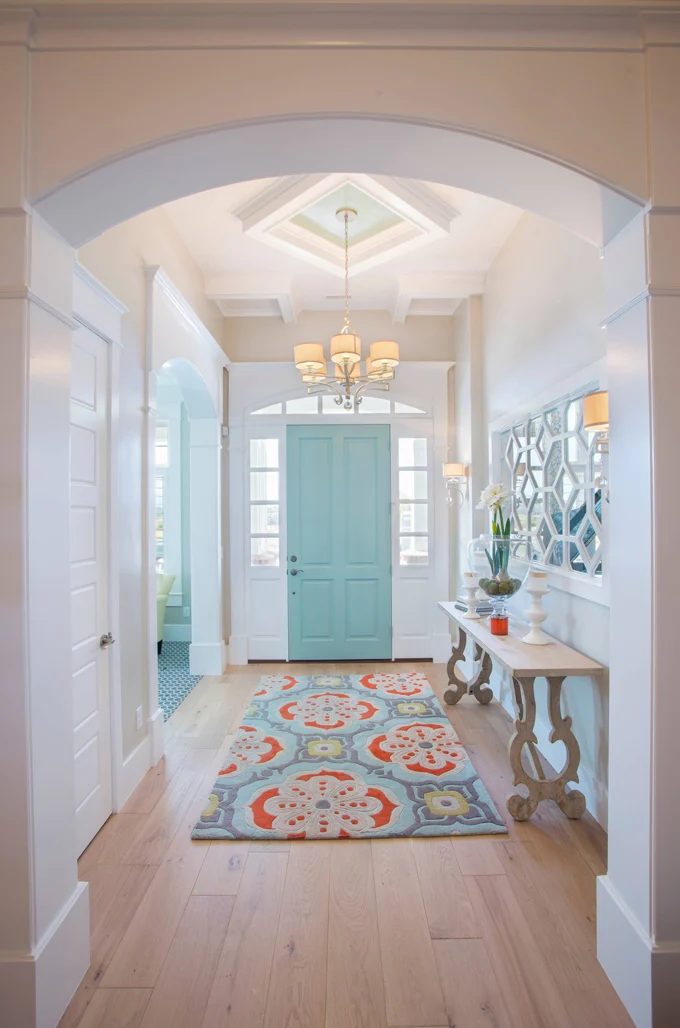 This entryway is practically well fitted and vivid! Interior Door painted with Wythe Blue from Benjamin Moore.