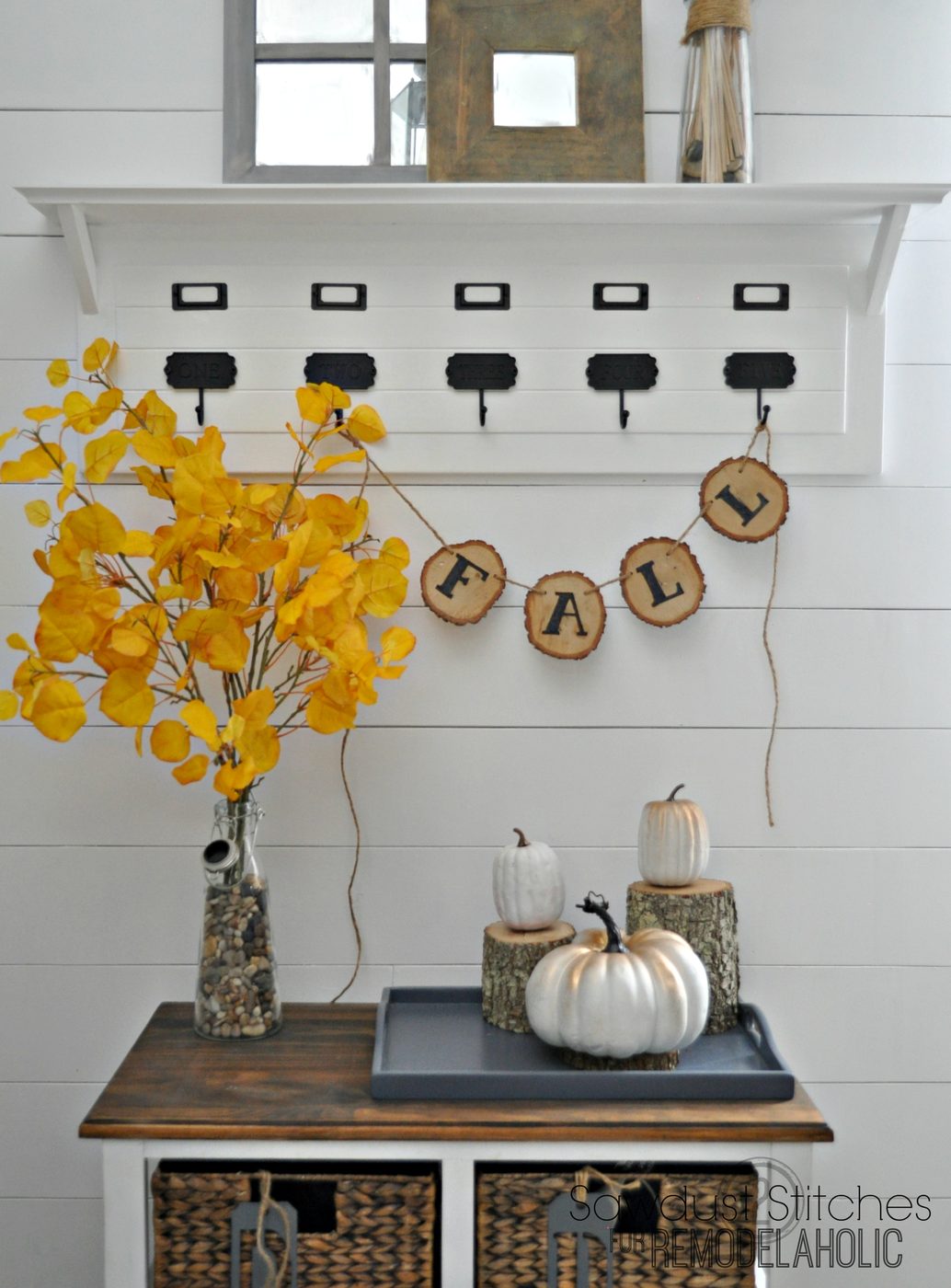 straightforward fall decor, just use a woodburner or a permanent marker to write on wood slices to make a cute decorative banner!