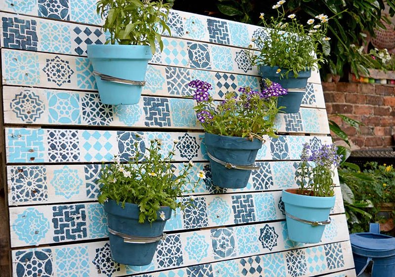 Friday Favorites: Planter Wall, Sea Glass Candles, and Handmade Console Table