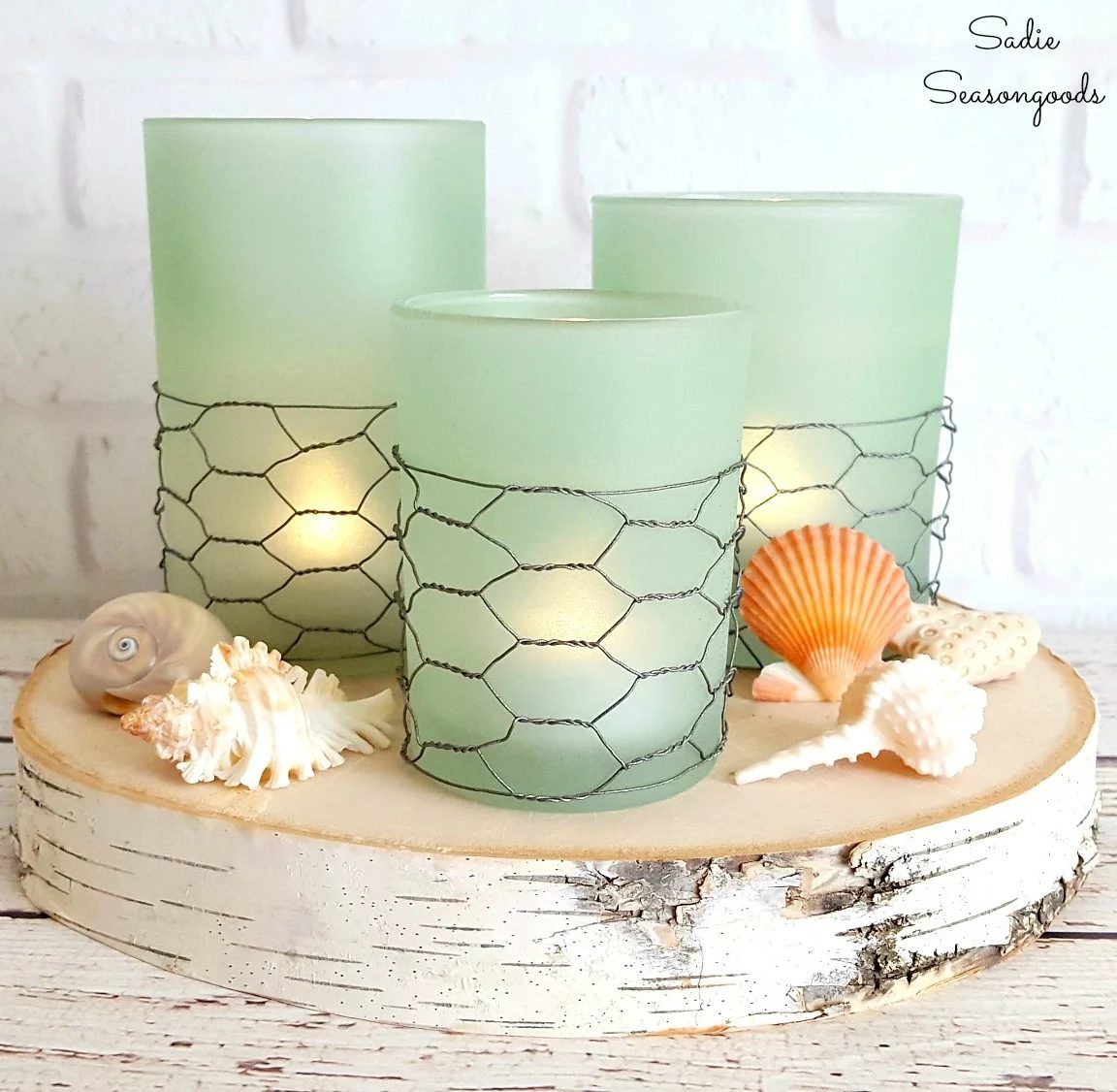 10 Handmade Coastal Farmhouse Style Seaglass Candles Using Repurposed Thrift Store Glass Candle Holders By Sadie Seasongoods