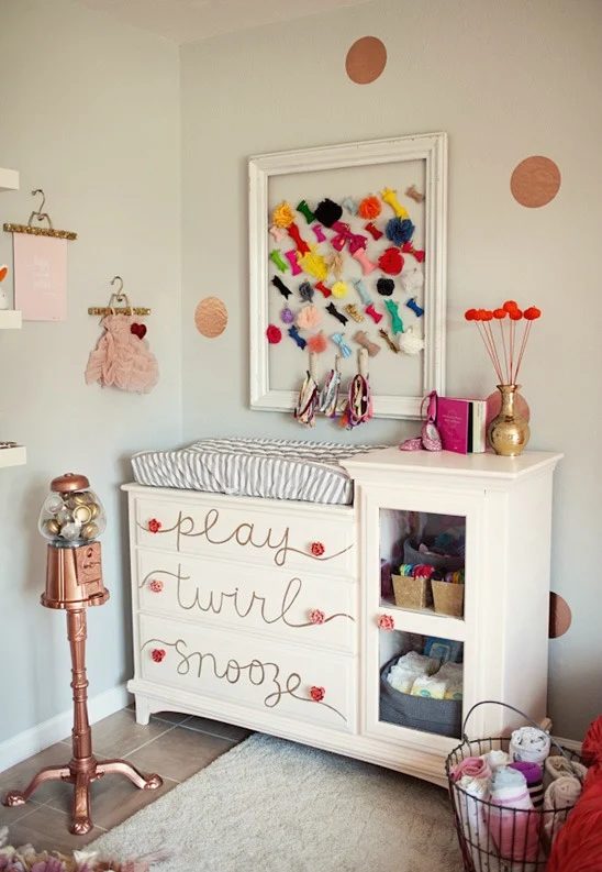 handwritten words on a child's dresser drawers for a nursery via The Little Umbrella