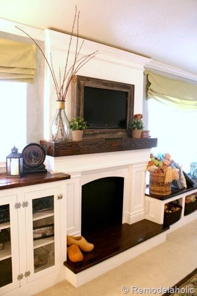 reclaimed wood framed TV with mantel to hide the cords (Bekob)