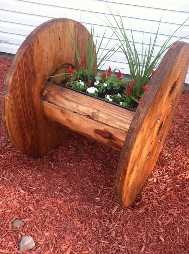 large-wood-cable-spool-turned-planter-original-source-unknown