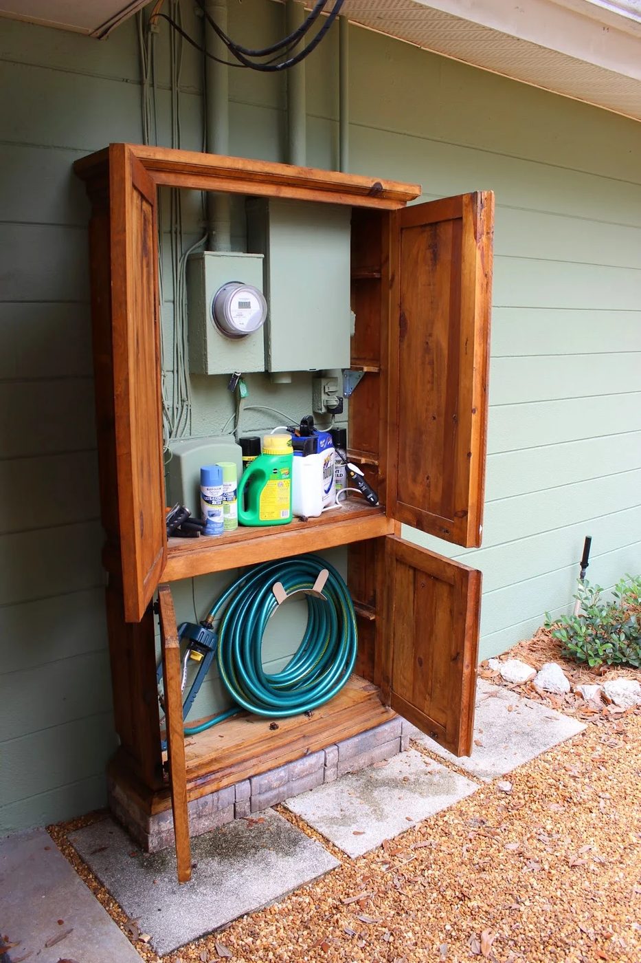 use a secondhand armoire to cover unsightly meters and provide storage, Shabby Glam