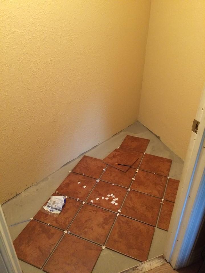pantry makeover, installing new flooring and shelves