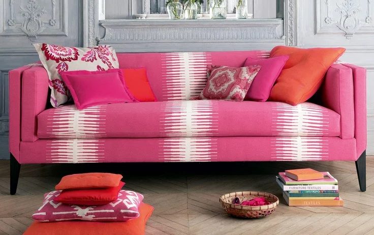 fuchsia sofa and fabrics