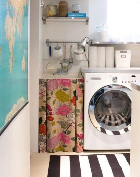 Floral fabric in the laundry room from Sarah Hartill