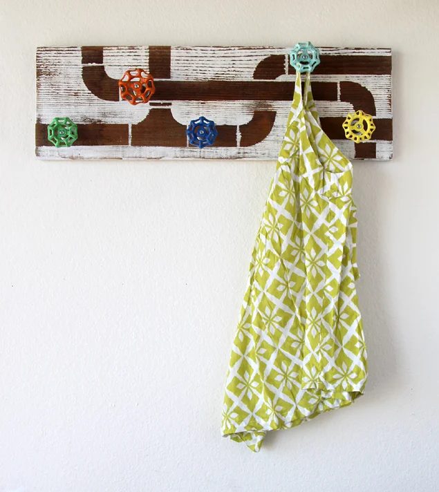 plumbing coat rack with repurposed faucet handles and reclaimed wood (A Piece of Rainbow)