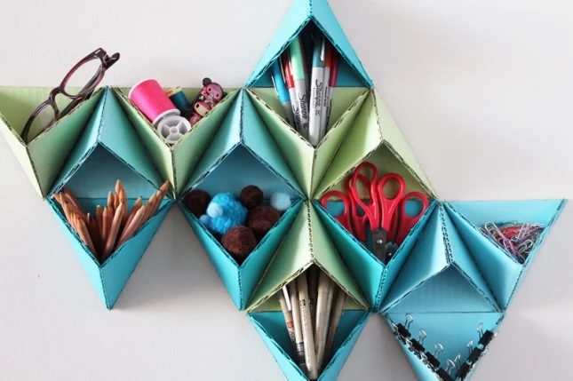 upcycled triangular storage wall (via brit-co)