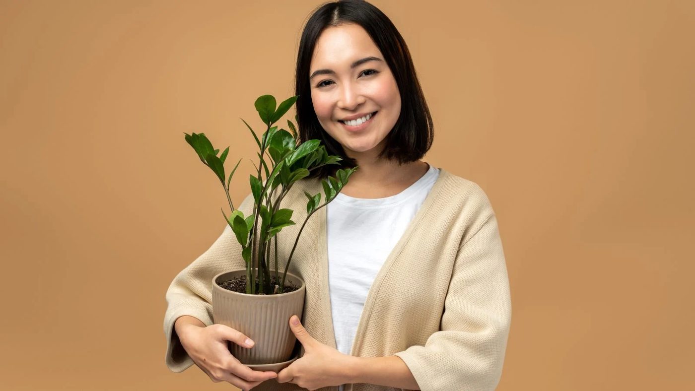 Woman Holding Sword Plant