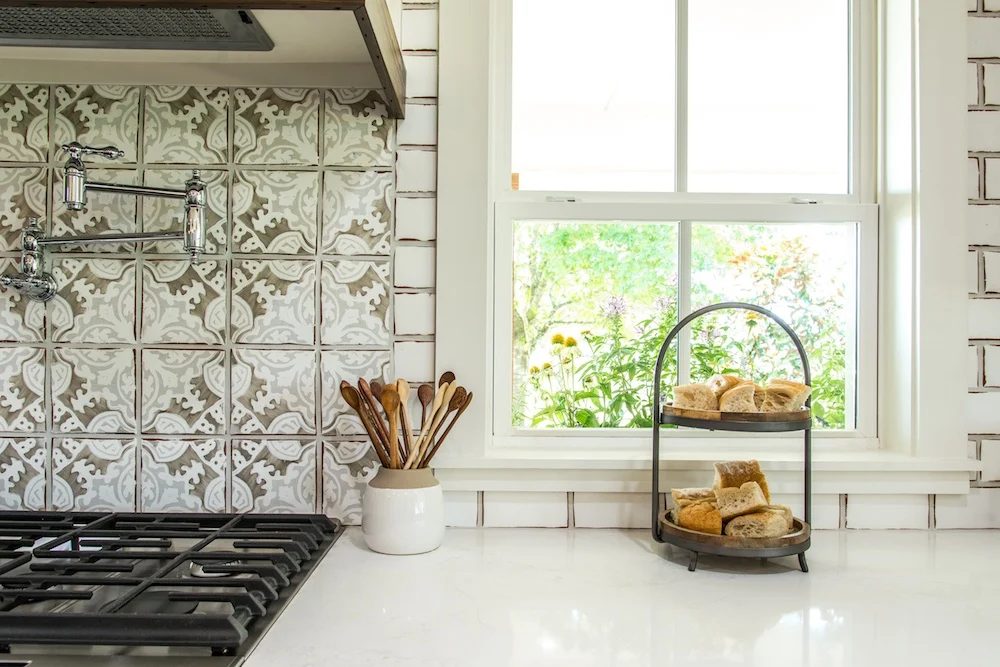 Get This Look: Fixer Upper Worm House Kitchen Image via Magnolia used with permission, striking tile and tiered tray for the kitchen