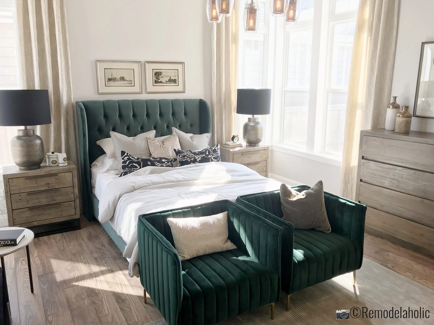 SLPH Model Home 1 Holmes Homes Green upholstered headboard