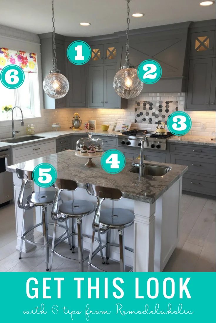 Get This Look: Glamorous Gray Kitchen | Give your kitchen a classic modern look with these tips for recreating this striking gray kitchen with a white island, marble countertops, a