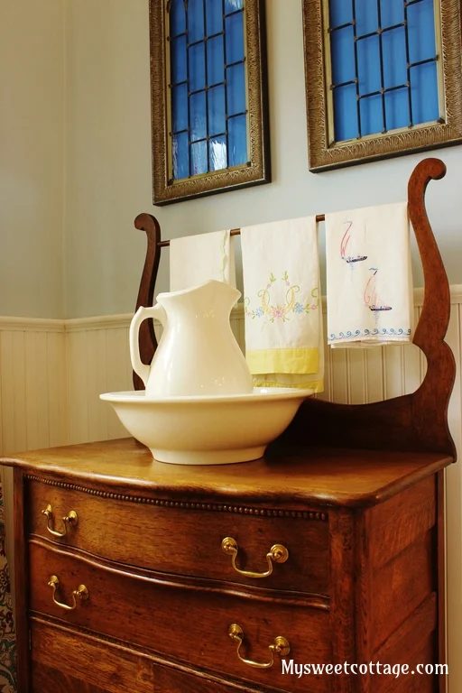 21 Antique washstand and wash basin complement 1920s cottage bathroom remodel, My Sweet Cottage featured on @Bekob