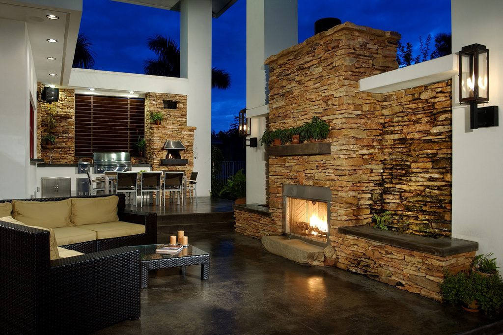 vivid outdoor kitchen, dining room, and living room, all in one