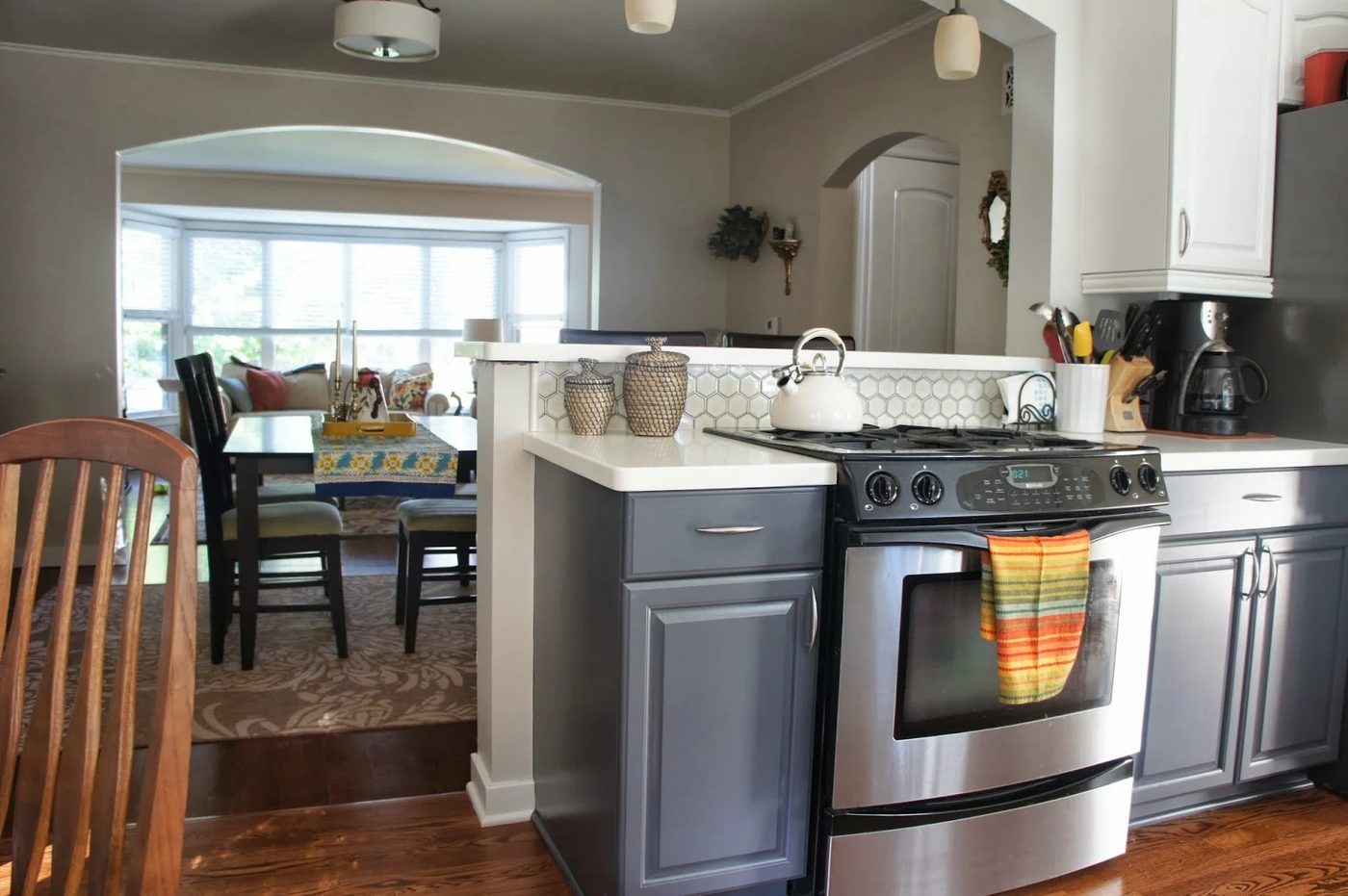 gray and white kitchen and dining room, LoveLee Homemaker featured on Bekob