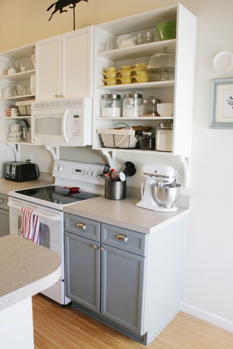 gray and white kitchen with open cabinets, Pretend Fancy featured on Bekob