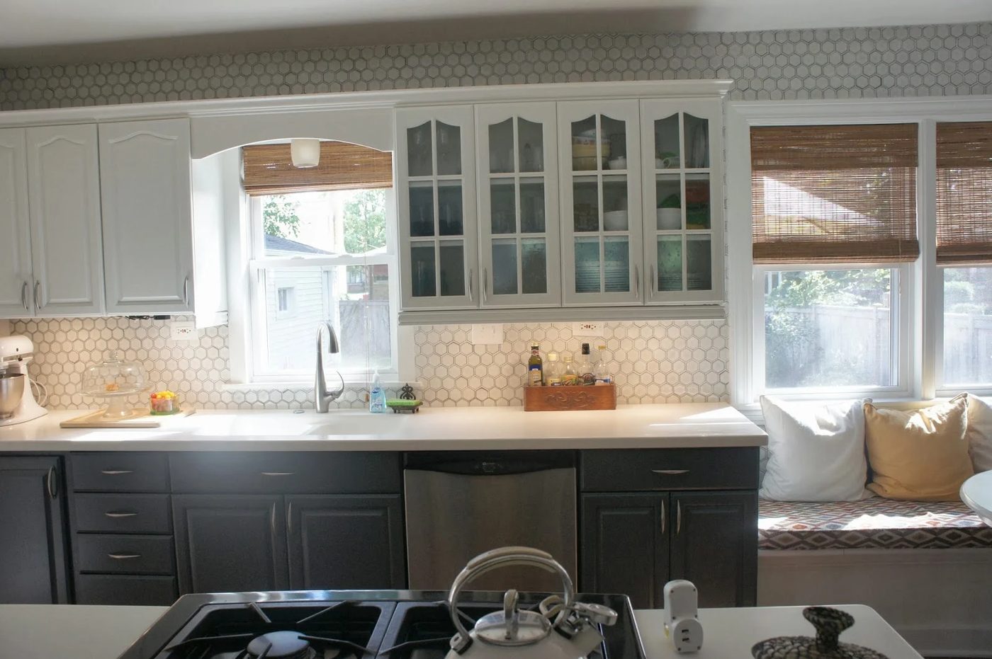 kitchen makeover with hexagon tile backsplash and painted gray and white cabinets, LoveLee Homemaker featured on Bekob