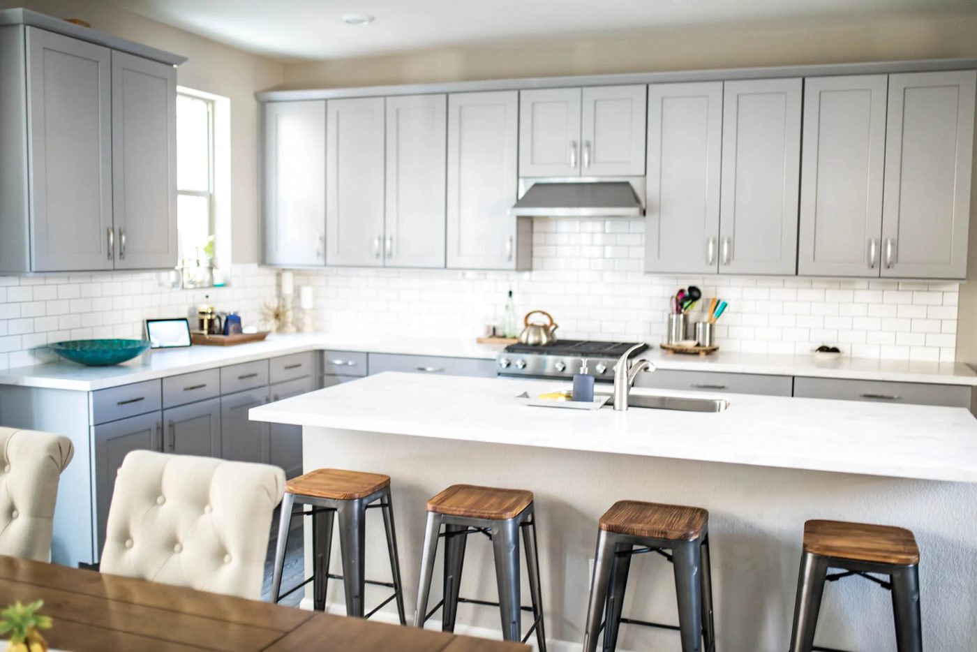 Gray And White Kitchen Cabinets With Subway Tile Backsplash, Never Skip Brunch