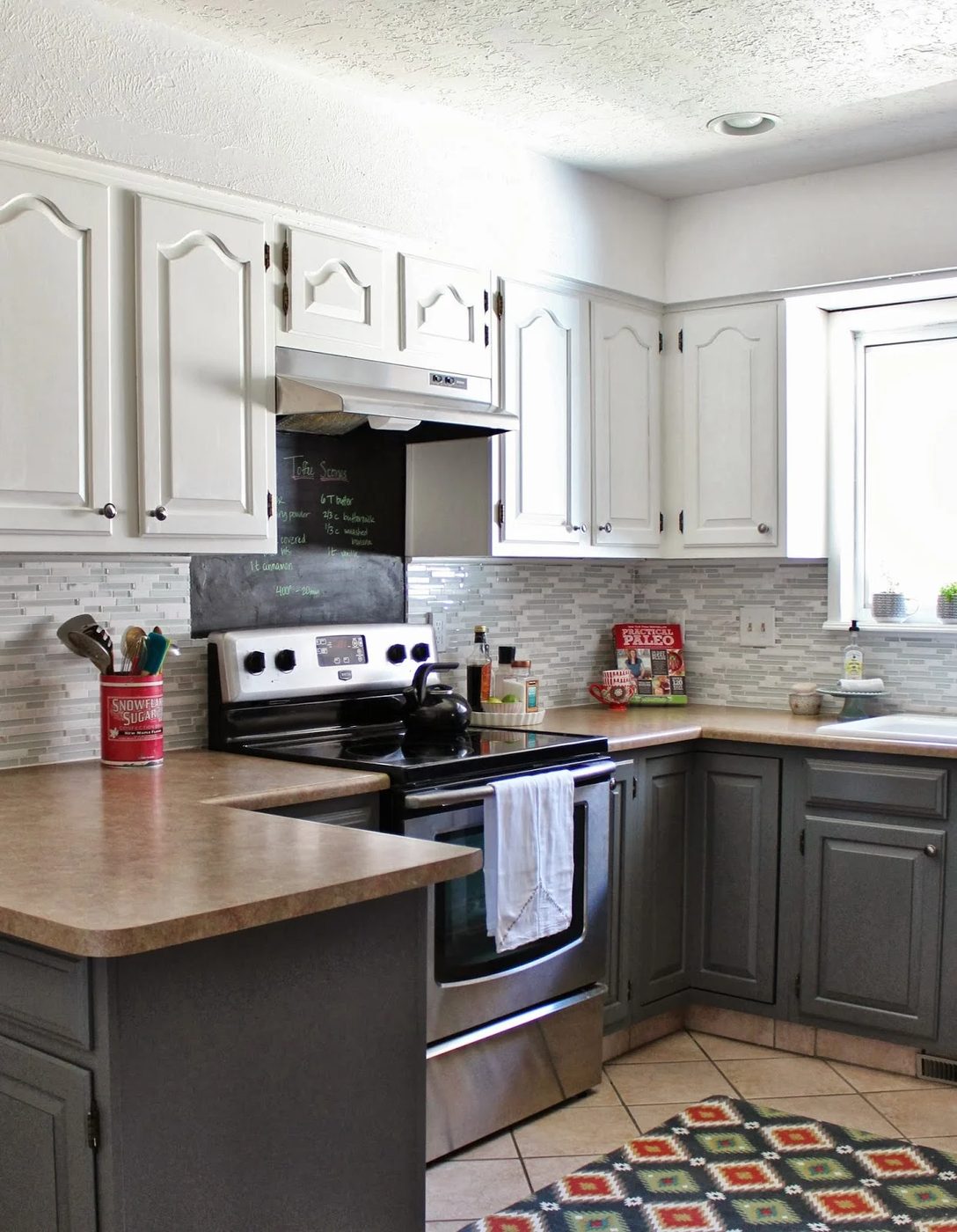 extend white painted cabinets to the ceiling to add visual height, House For Five featured on Bekob