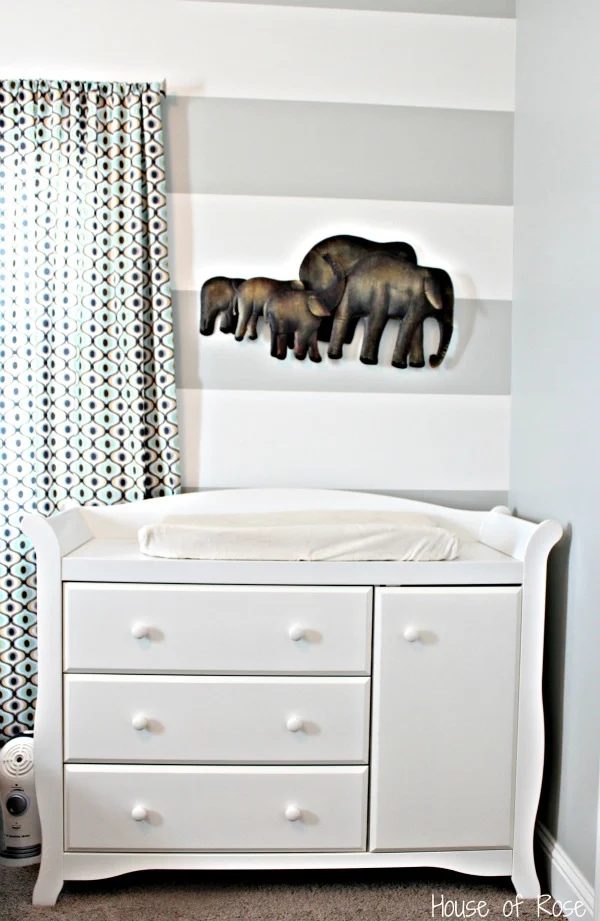 Changing Table With Striped Wall And Elephants