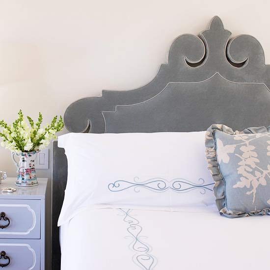 gray velvet carved ornate headboard via BHG