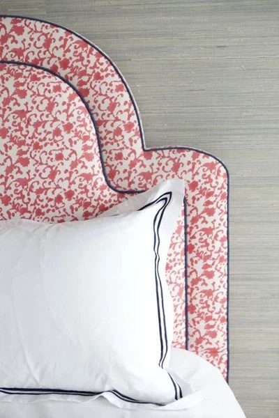 pink patterned keystone headboard via Metropolitan Musings