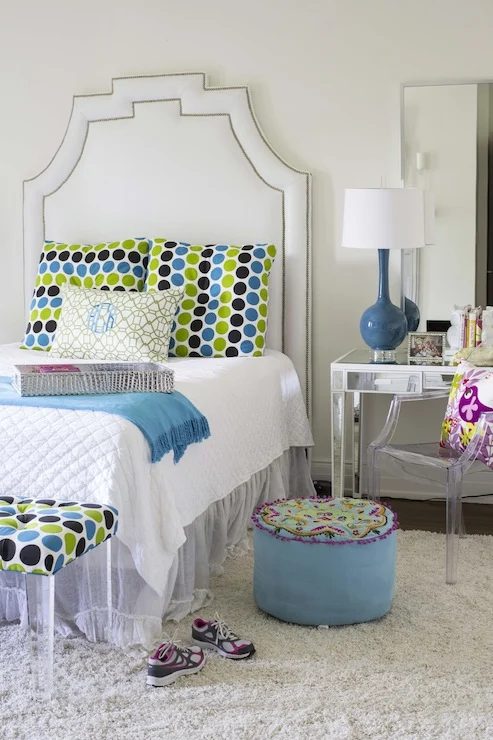 tall stepped keystone headboard in white with nailhead trim via DecorPad