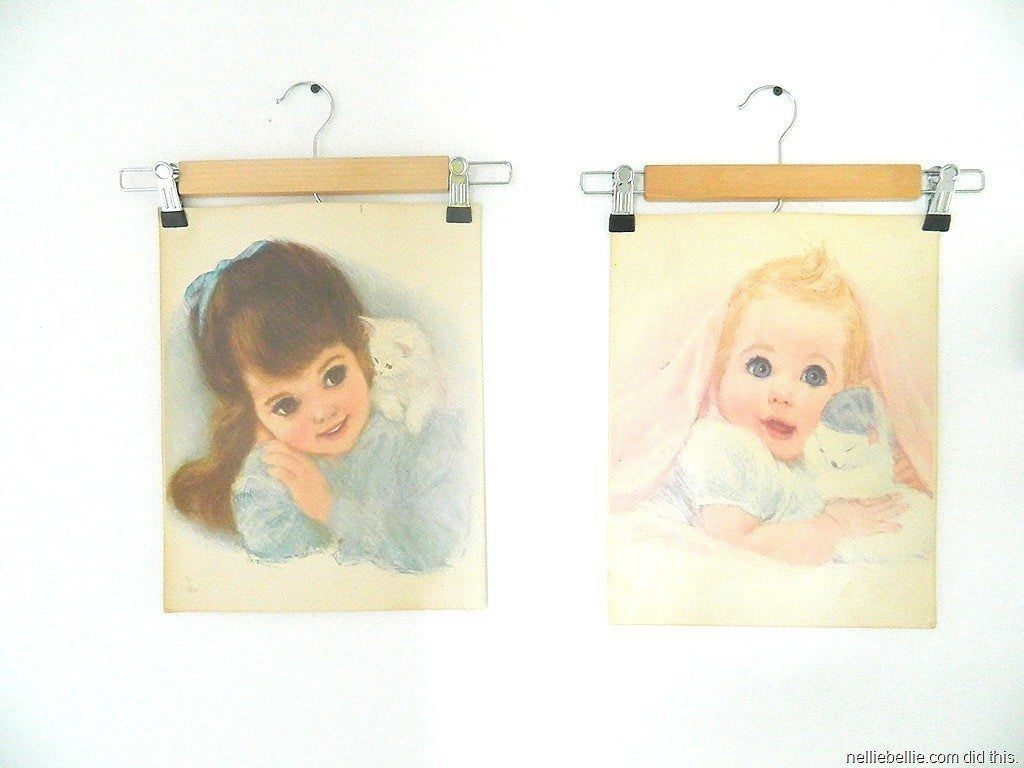Pants hangers make an interesting way to hang posters and prints!