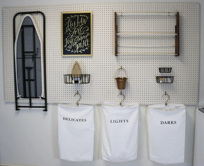 Handmade Peg Board in Laundry Room